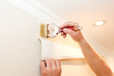 Pose de papier peint à Jumelles — revêtements muraux et toiles de verre
